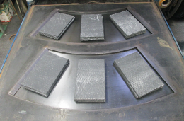 Set the material in the mold